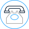Icon of a classic rotary telephone enclosed within a double blue circular outline. The phone is drawn with simple blue and gray lines.
